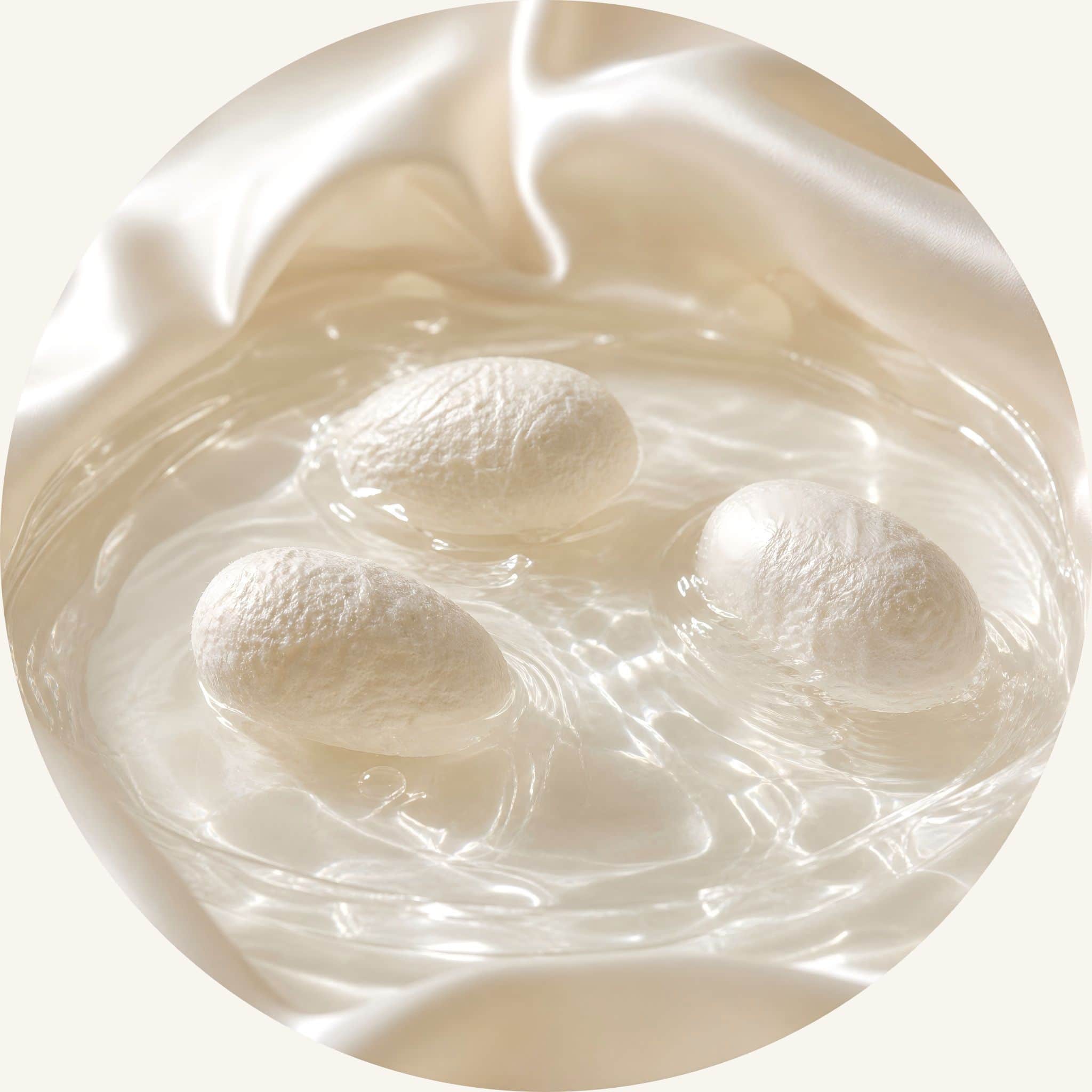 SootheHerbs Silk Protein cocoons in glistening water, a key ingredient in our strengthening conditioner bar to mend broken strands and wrap each hair fiber in weightless smoothness.